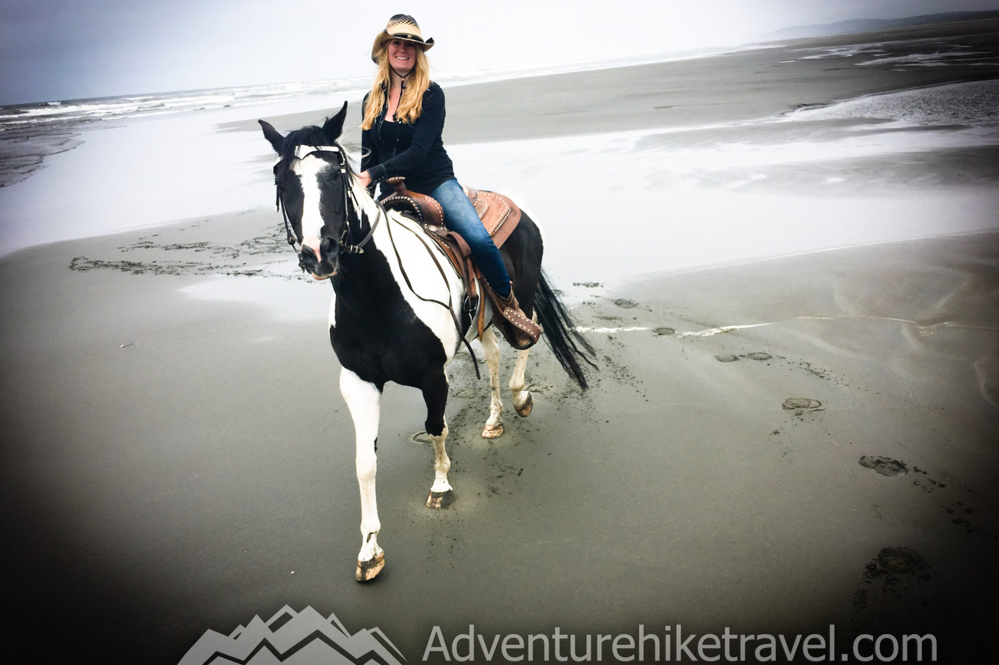 Horseback riding on the beach ocean shores