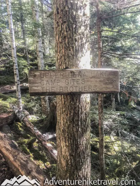 Just a couple feet past this sign is a great viewpoint for Lower Lena Lake. It's definitely worth the few extra steps and then backtracking to this sign to take in the beautiful green and blue hues of Lower Lena.