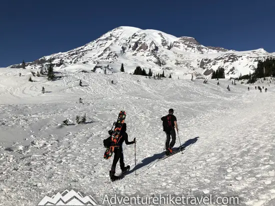 New to snowshoeing? Are you a local living in Washington State or visiting the Pacific Northwest during winter? Want something fun to do? Try snowshoeing at Mt. Rainier National Park.Our First-timer’s Guide to Snowshoeing at Mt. Rainier can give you the information you need to take off on your own snowshoeing adventure. #hiking #nature #mountains #adventure #travel #Mtrainier #traveltips #experiencewa #snowshoeing #pacificnorthwest #wastate #nationalparks #ustravel