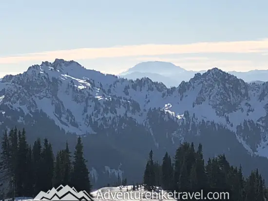 New to snowshoeing? Are you a local living in Washington State or visiting the Pacific Northwest during winter? Want something fun to do? Try snowshoeing at Mt. Rainier National Park.Our First-timer’s Guide to Snowshoeing at Mt. Rainier can give you the information you need to take off on your own snowshoeing adventure. #hiking #nature #mountains #adventure #travel #Mtrainier #traveltips #experiencewa #snowshoeing #pacificnorthwest #wastate #nationalparks #ustravel