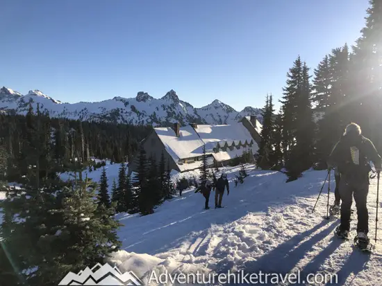 New to snowshoeing? Are you a local living in Washington State or visiting the Pacific Northwest during winter? Want something fun to do? Try snowshoeing at Mt. Rainier National Park.Our First-timer’s Guide to Snowshoeing at Mt. Rainier can give you the information you need to take off on your own snowshoeing adventure. #hiking #nature #mountains #adventure #travel #Mtrainier #traveltips #experiencewa #snowshoeing #pacificnorthwest #wastate #nationalparks #ustravel