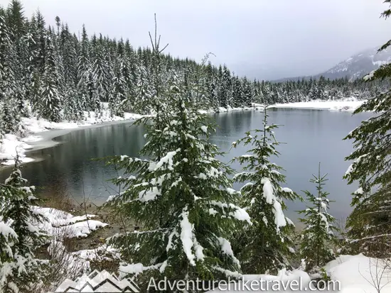 New to snowshoeing? Or just need a fun day-trip getaway? Try snowshoeing the Gold Creek Pond Trail east of Snoqualmie Pass in Washington State. With easy access just off I-90 at Exit 54, you can start snowshoeing through the tall evergreen trees on the edge of the Mount Baker-Snoqualmie National Forest just minutes after parking your car. #hiking #nature #mountains #adventure #travel #traveltips #experiencewa #snowshoeing #pacificnorthwest #wastate #nationalparks #ustravel