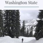 Looking for an easy snowshoeing destination with gorgeous views? Check out the Skyline Lake Trail in Washington State. This short yet steep hike has stunning mountain peaks and snow-covered boulder fields leading to a frozen lake. This is a great place to spend a fun-filled day in the mountains.