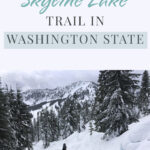 Looking for an easy snowshoeing destination with gorgeous views? Check out the Skyline Lake Trail in Washington State. This short yet steep hike has stunning mountain peaks and snow-covered boulder fields leading to a frozen lake. This is a great place to spend a fun-filled day in the mountains.