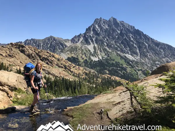 Interested in Backpacking to Lake Ingalls and Headlight Basin in the Alpine Lakes Wilderness? Lake Ingalls is a stunning alpine lake located in the heart of the Alpine Lakes Wilderness of Washington State, offering a challenging yet rewarding backpacking experience for outdoor enthusiasts. With its crystal clear blue-green water and the impressive view of Mount Stuart, the second tallest non-volcanic peak in Washington looming above Lake Ingalls, is impressive, to say the least.