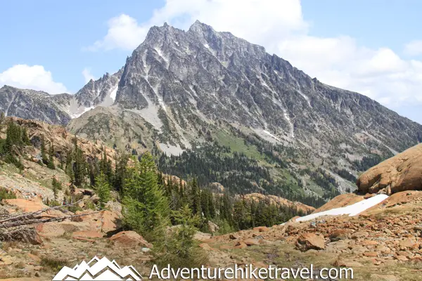 Interested in Backpacking to Lake Ingalls and Headlight Basin in the Alpine Lakes Wilderness? Lake Ingalls is a stunning alpine lake located in the heart of the Alpine Lakes Wilderness of Washington State, offering a challenging yet rewarding backpacking experience for outdoor enthusiasts. With its crystal clear blue-green water and the impressive view of Mount Stuart, the second tallest non-volcanic peak in Washington looming above Lake Ingalls, is impressive, to say the least.