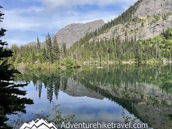 😍 Explore the hidden gem of Olympic National Park: Lake Angeles! This captivating hiking destination offers tranquility and natural beauty, with breathtaking panoramic views from imposing rocky cliffs. Surrounded by crystal-clear blue-green waters, lush greenery, and abundant wildlife, it's a true hiker's paradise. 🎒 Join us for a comprehensive guide on hiking and backpacking to this enchanting location. #LakeAngeles #HikingAdventures