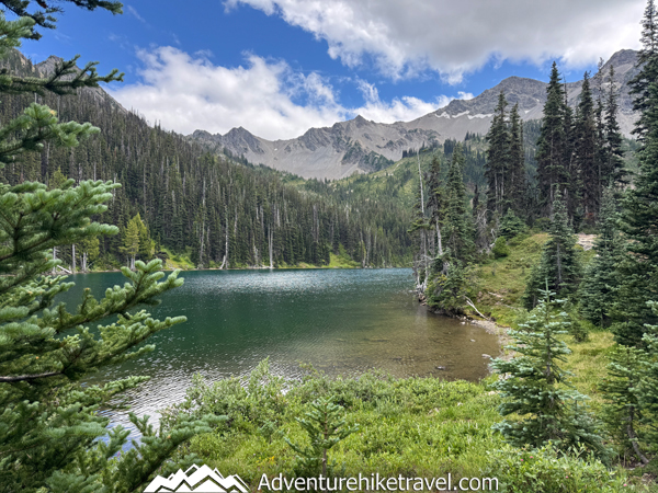 Turquoise Moose Lake in Olympic National Park surrounded by alpine peaks and ridgelines