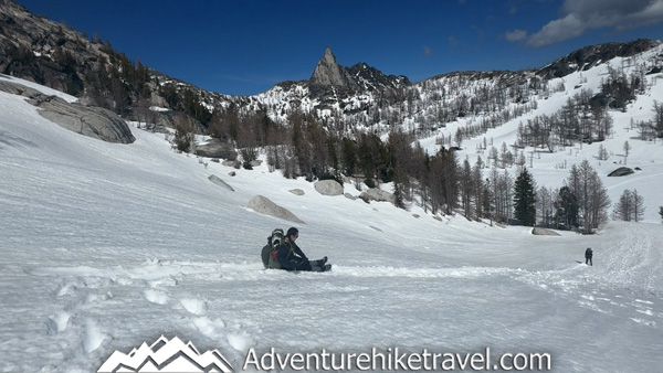 Get detailed trail information from our spring backpacking trip through the Enchantments via the Snow Lakes Trail to the Core Zone. This post covers mid-May trail conditions near Leavenworth, WA, including mileage, elevation gain, snow travel, route highlights, gear needed, and what conditions looked like above Snow Lakes during early season backpacking in Washington’s Alpine Lakes Wilderness.
